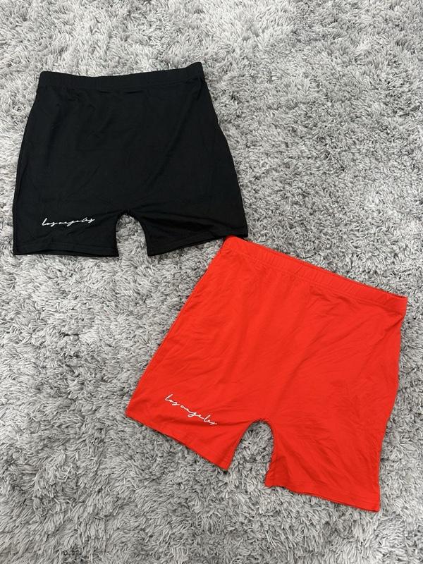 Shor Deportivo - Black and Red Shorts with "shor deportivo" Text on Fabric Shor Deportivo - Black and Red Shorts with "shor deportivo" Text on Fabric