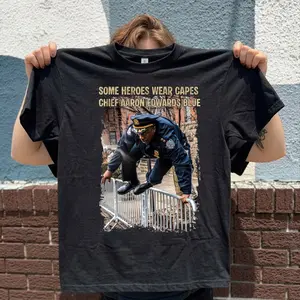 Some heroes Wear Capes — Chief Aaron Edwards Wears Blue Shirt