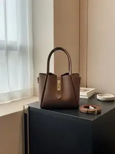 Women’s solid-color faux leather bucket bag, fashionable crossbody with adjustable shoulder strap, zippered pouch design, casual versatile women’s shoulder bag, everyday handbag, multifunctional backpack suitable for work, parties, shopping, and gifting t