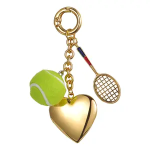 Tennis Heart Locket Keychain: Gold Plated Key Chain with Tennis Ball and Racket Charm Heart-shaped Lockets Picture Frame Pendant Bag Purse Sports Accessory for Women