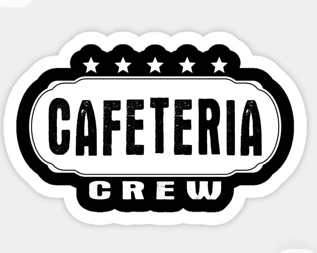 A black cafeteria acrylic badge