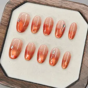 Elegant Orange and Red Ombre Gradient Short Round Handmade Press On Nails Set with Sparkling Accents for Stylish Manicures