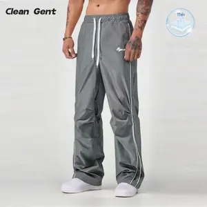 Clean Gent street style loose sweatpants, men's trousers, light and soft fabric, side striped decoration, comfortable design, casual sports bottoms 100% polyester fiber, breathable and sweat-absorbing, suitable for all seasons