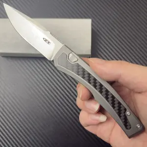 ZT0506 Folding Knife with Carbon Fiber & Sandblasted Titanium Handle, a portable EDC tool. Non-slip grip fruit knife for home use, featuring a razor-sharp blade ideal for camping, package opening. Perfect Valentine's Day gift for men.