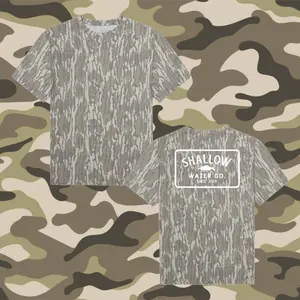 Mossy Oak Shallow Water Co Letter Print Tee | Original Bottomland Camo Short Sleeve Shirt | Vintage Washed Out Hunting Graphic Tee | Premium Outdoor Camouflage Apparel