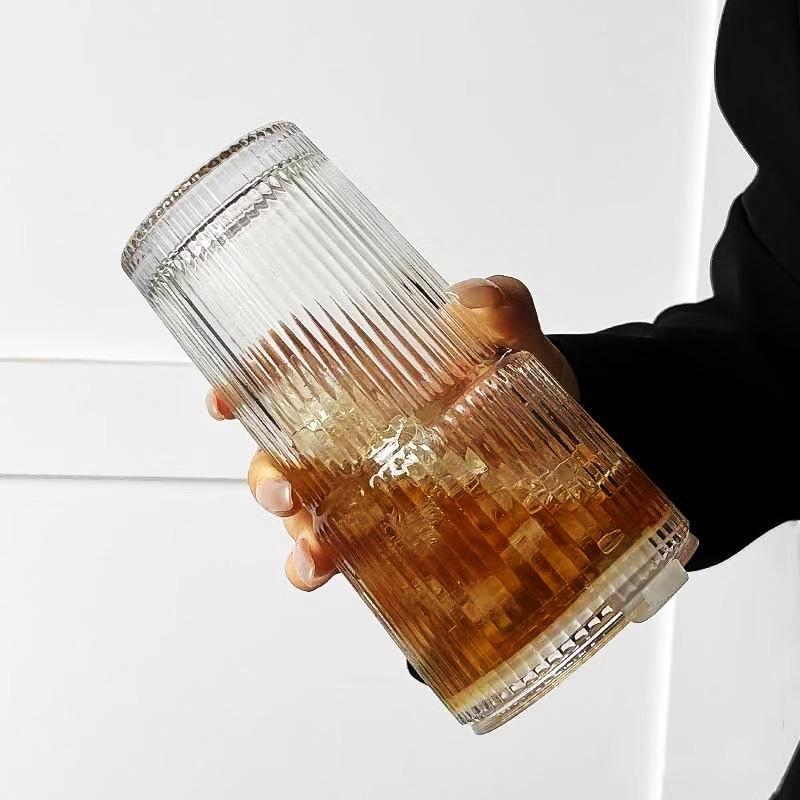 16 oz Ribbed Glass Tumblers with Lids and Glass Straws 1-Piece Glassware Set Thickened Wall Ideal for Iced Coffee Smoothies Cocktails and Juices Elegant and Durable Drinkware
