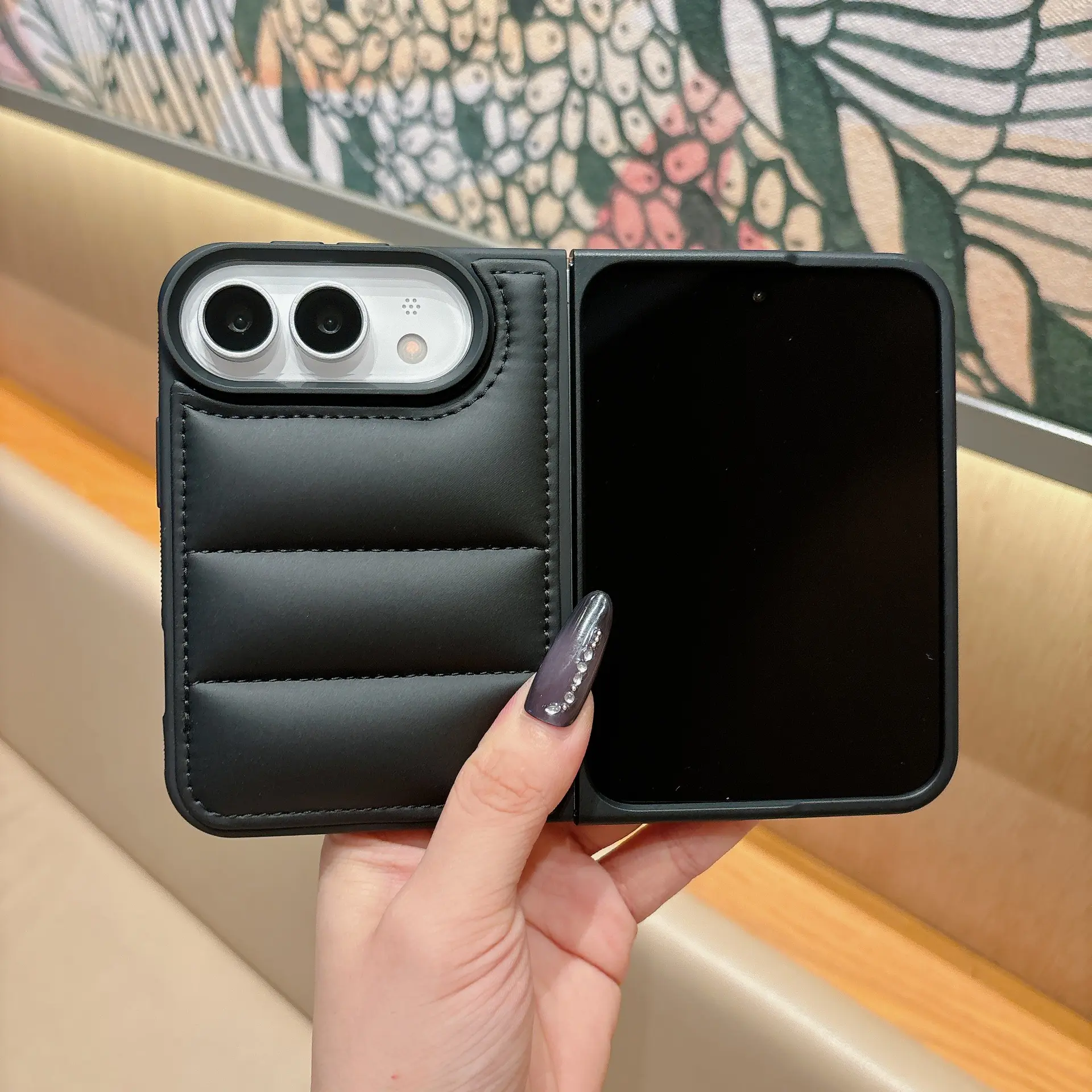 Trendy, creative puffer jacket–style case compatible with iPhone 18 duo/18 Fold, featuring a foldable design and screen protection for the left/right display.