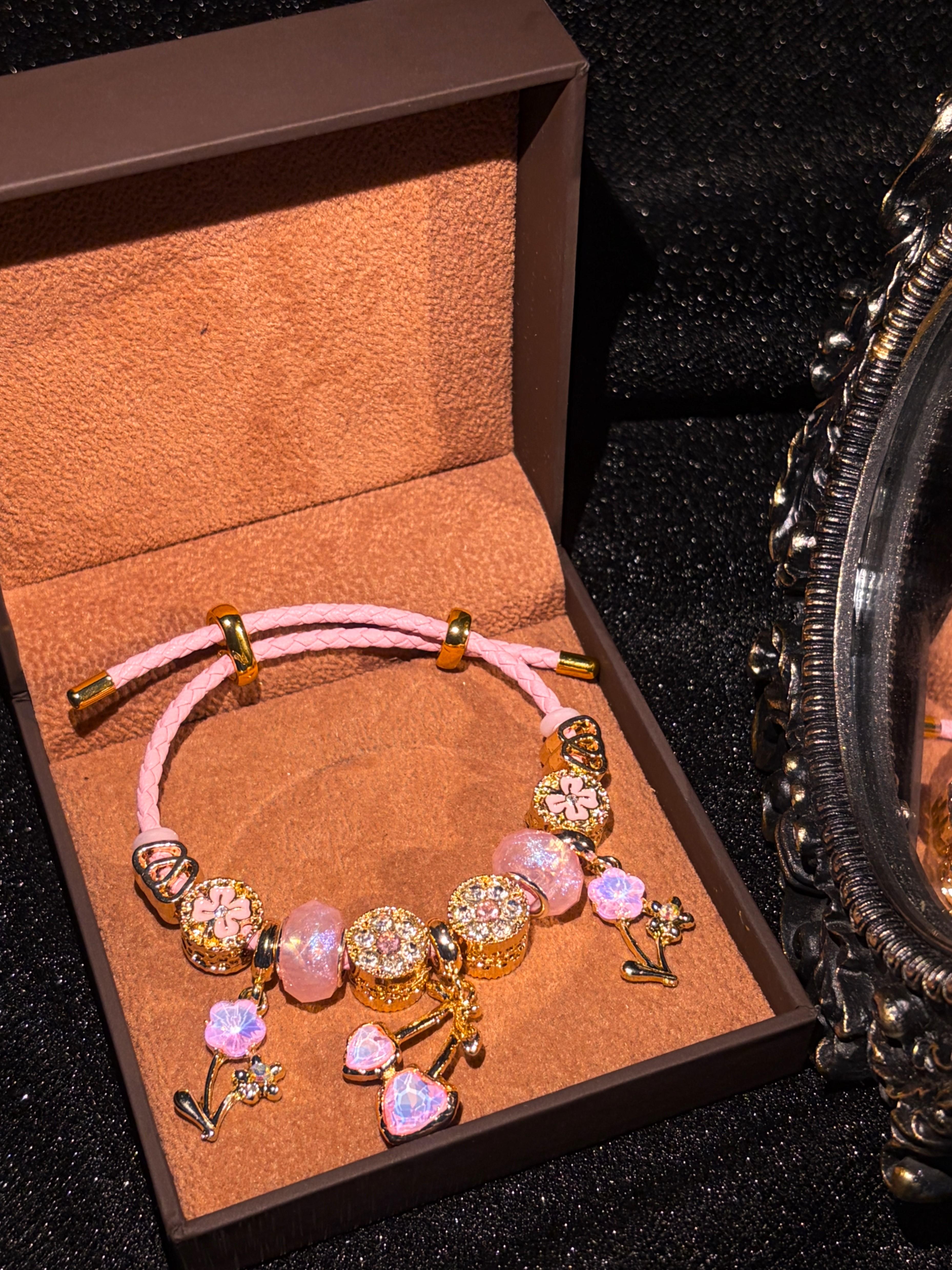 Women's Blush Pink Faux Leather Rope Charm Bracelet - Gold-Tone, Cherry Heart & Flower Crystal Pendants - Sweet Elegant Costume Jewelry Statement Piece
