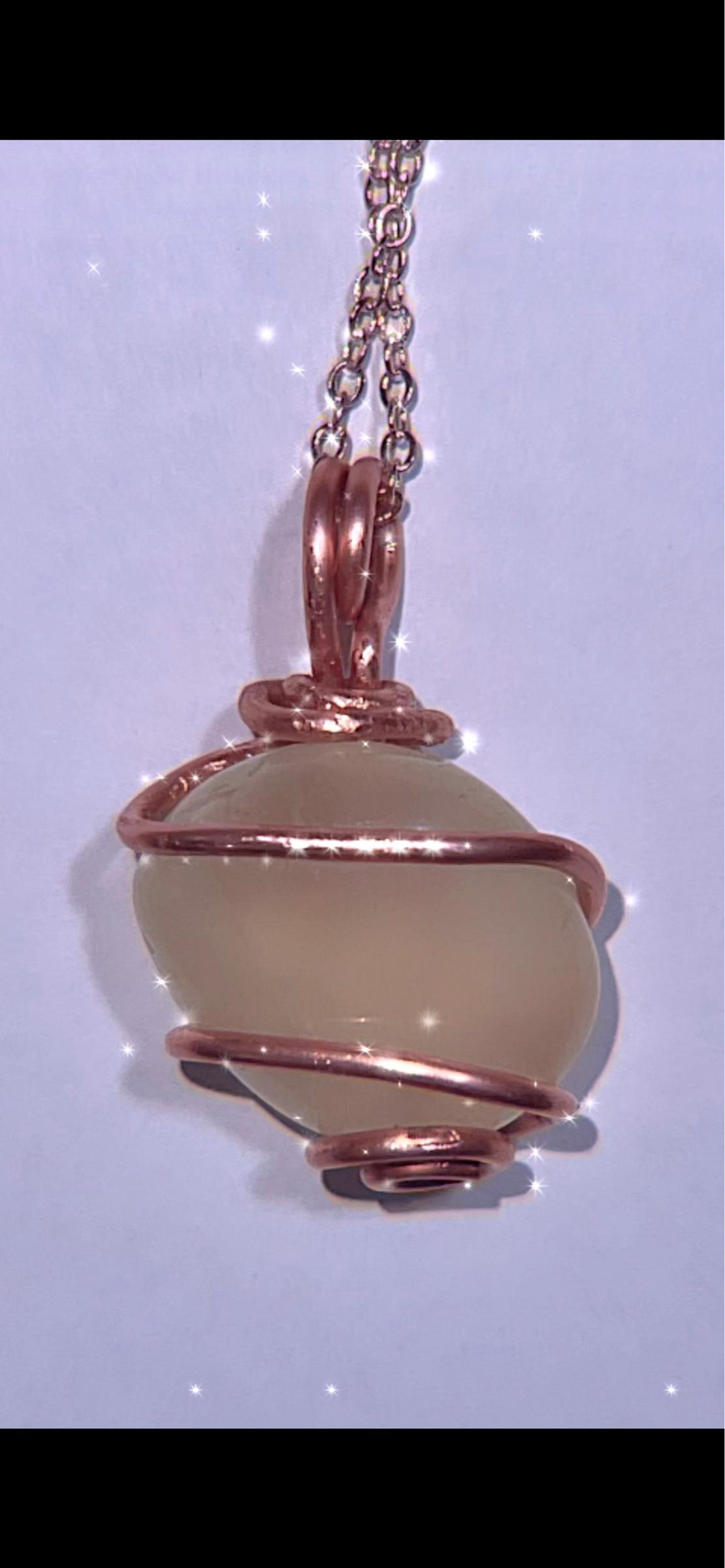Citrine Crystal Pendant wrapped in pure copper wire, on a rose gold plated copper necklace.