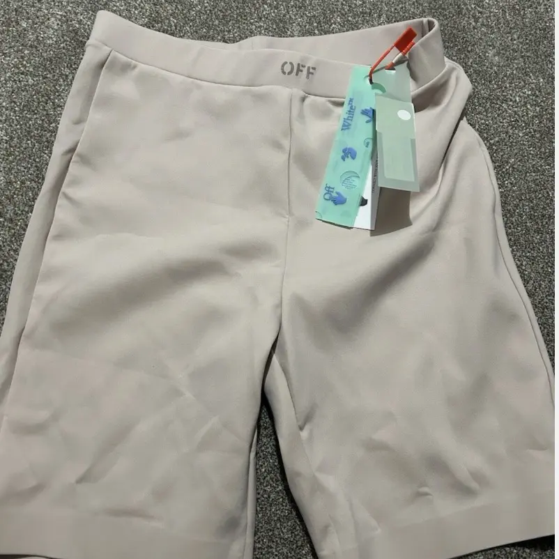 Unisex Off-White High-Rise Contouring Biker Shorts - Nude, 38IT, 22 inches, Minimalist Block-Letter Logo, Elastic Waist, Fitted Supportive Fit, Mid-Weight Stretch Fabric, Plain Smooth, High-End Streetwear, Active for Gym Sessions