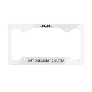 Just One More Chapter Metal License Plate Frame for Book Lovers - Slim Glossy Aluminum with Open-Book Motif & Durable White Construction