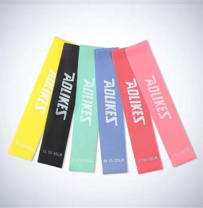 Resistance loop bands, set of six, available in various colors, suitable for strength training and fitness exercises, offering multiple resistance levels, made of high-quality materials, and includes a portable storage bag.