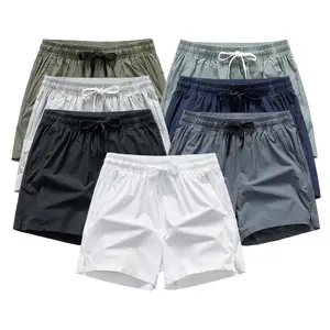 Men’s fashion casual athletic shorts with a drawstring waist, zippered pockets, regular fit, solid color, ice silk design, quick-drying and breathable, suitable for both casual and sports wear