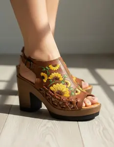 Women's heeled sandals, handmade in Mexican leather with embroidered flowers, style 517. Open toe and ankle strap. Genuine leather upper. Comfortable. Ethically made in Mexico. Ideal for walking.