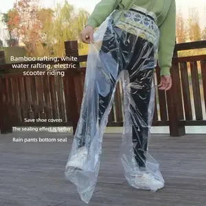 Disposable one-piece rain pants for glass slide rafting, featuring a split design; dustproof, dirtproof, waterproof, and includes waterproof shoe covers for rain protection.