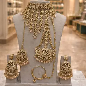 Indian Bridal Set in Shadow Stone Champagne Gold with Intricate Floral Design and Pearl Accents