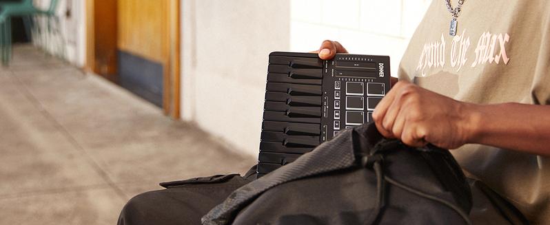 Donner DMK25 Pro MIDI Keyboard Controller, 25 Mini Key Portable USB-C MIDI Keyboard with 8 Drum Pads, OLED Display, Personalized Touch Bar, Music Production Software and 40 Free Courses