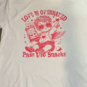 Love is over rated pass the snacks tee