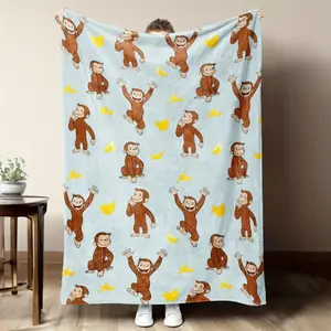 Soft Flannel Decorative Blanket - Curious George Monkey and Banana Design - Comfortable and Warm Light Blue Cartoon Design, Perfect for Sofas, Beds, or as a Cozy Office Blanket - The Perfect Gift for Friends and Family Flouncy garage guy