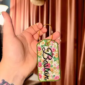 Handmade fabric, and embroidered bag tags