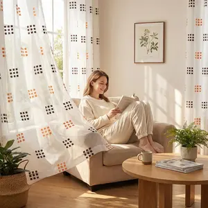 Window Wear 2 Panels 52X84Inch is made of bamboo-jointed linen fabric, combined with embroidery technique, featuring a two-color nine-square pattern, with a metal ring at the head. It is easy to install, has a unique style, and is labeled as CT278.