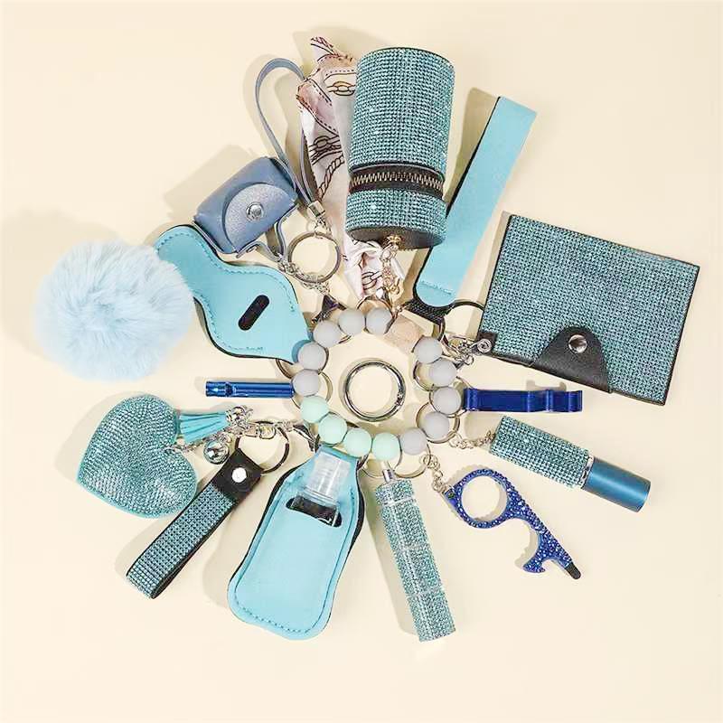 NewDesignHotWholesaleRhinestoneWomenSelf-DefenseAnti-WolfKeychain17pcsSetPompomsAlarmSelfDefense