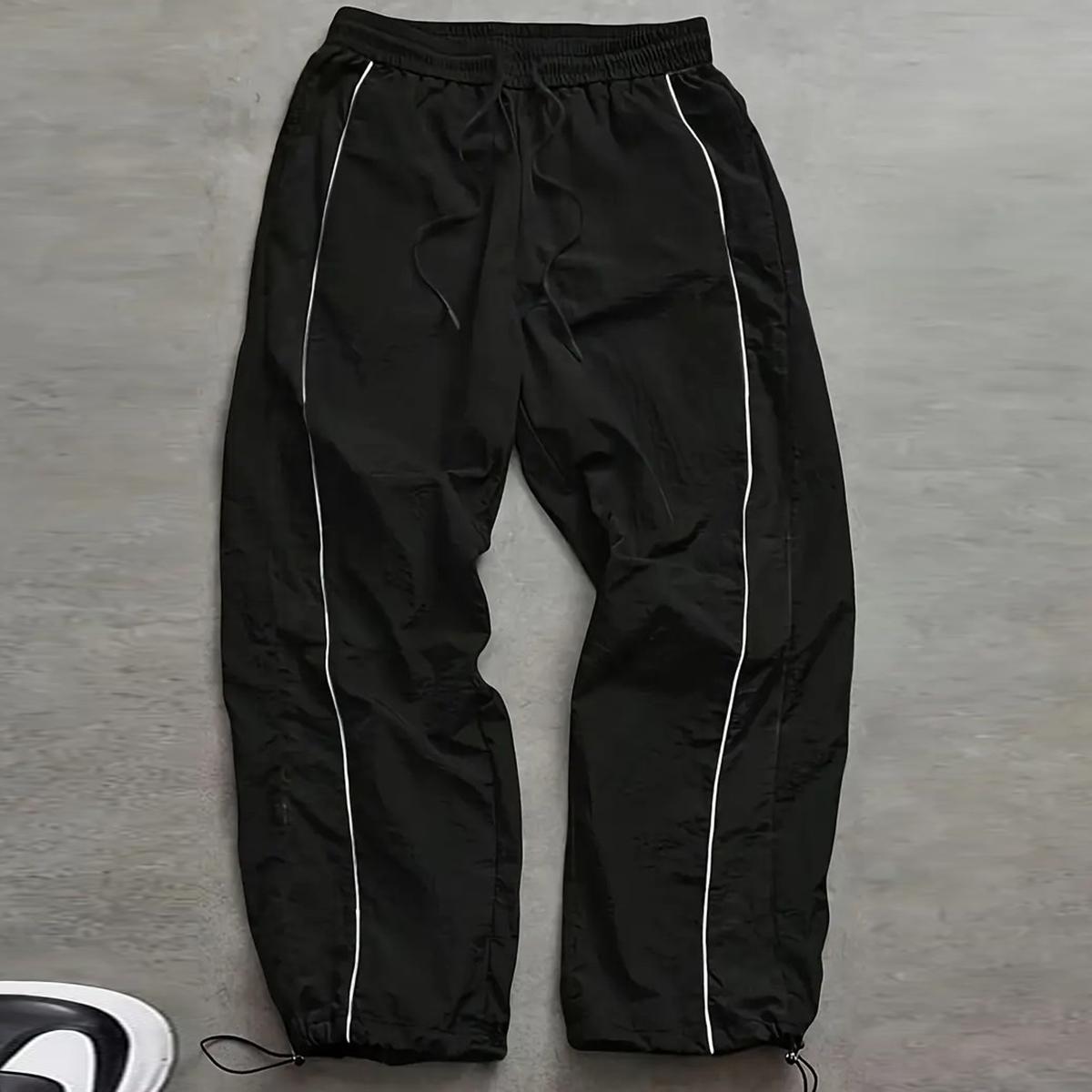Men's casual athletic pants relaxed fit with drawstring cuffs lightweight fabric perfect for everyday wear