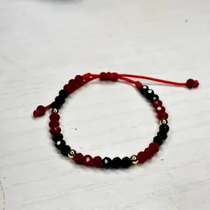 Red and Black Baby Bead Bracelet with Gold plated and Adjustable String for Stylish Everyday Wear
