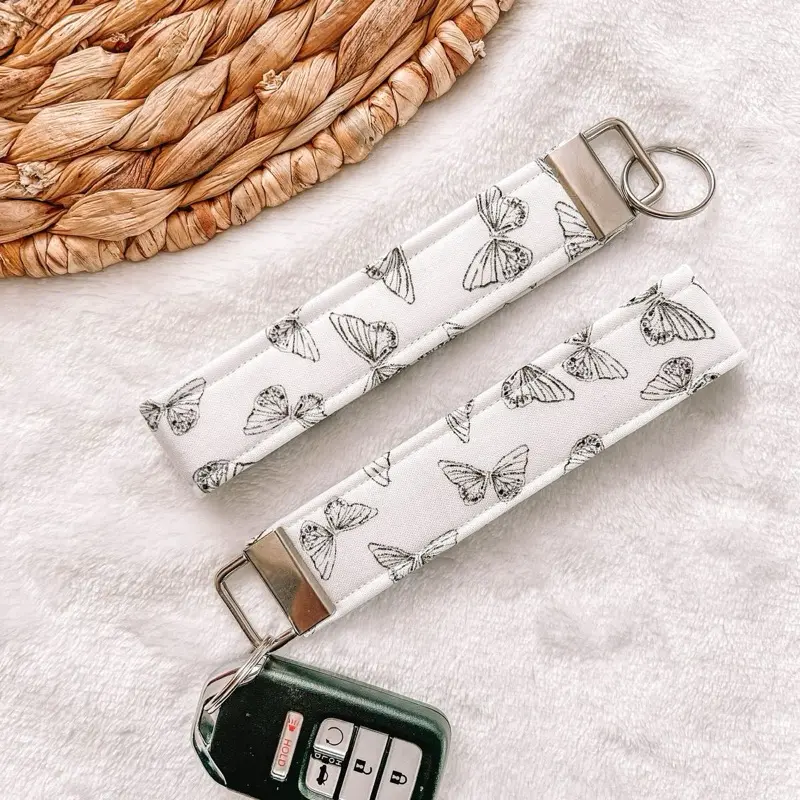 Butterfly Keychain Wristlet - White Butterfly Design, Two Handles, Adjustable Clip, Ideal for Everyday Use