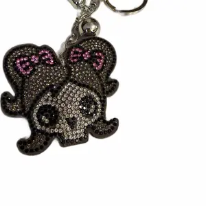 Gray skull girl bag charm