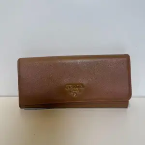 Pre-owned PRADA Leather Mini Bags Saffino wallet W7JX