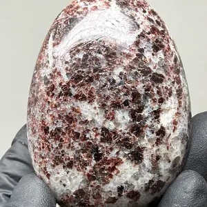 2.75” inch polished Garnet Palm Stone