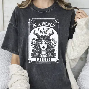Washed T-shirt Be Lilith Graphic | Retro Gothic Dark Aesthetic Acid Wash Tee | Viral Feminism Streetwear Statement Top | Trendy Unisex Casual Shirt | Premium Soft Cotton Apparel | Best Gift for Alt Girls | Bold High Contrast Art Tee
