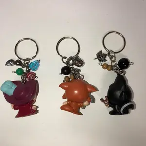 Flying boy characters doorables keychains
