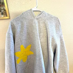 Size small grey hoodie with yellow lily flower patchwork