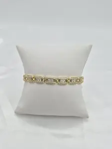 14k gold plated bracelet with zirconia stones.  (13)
