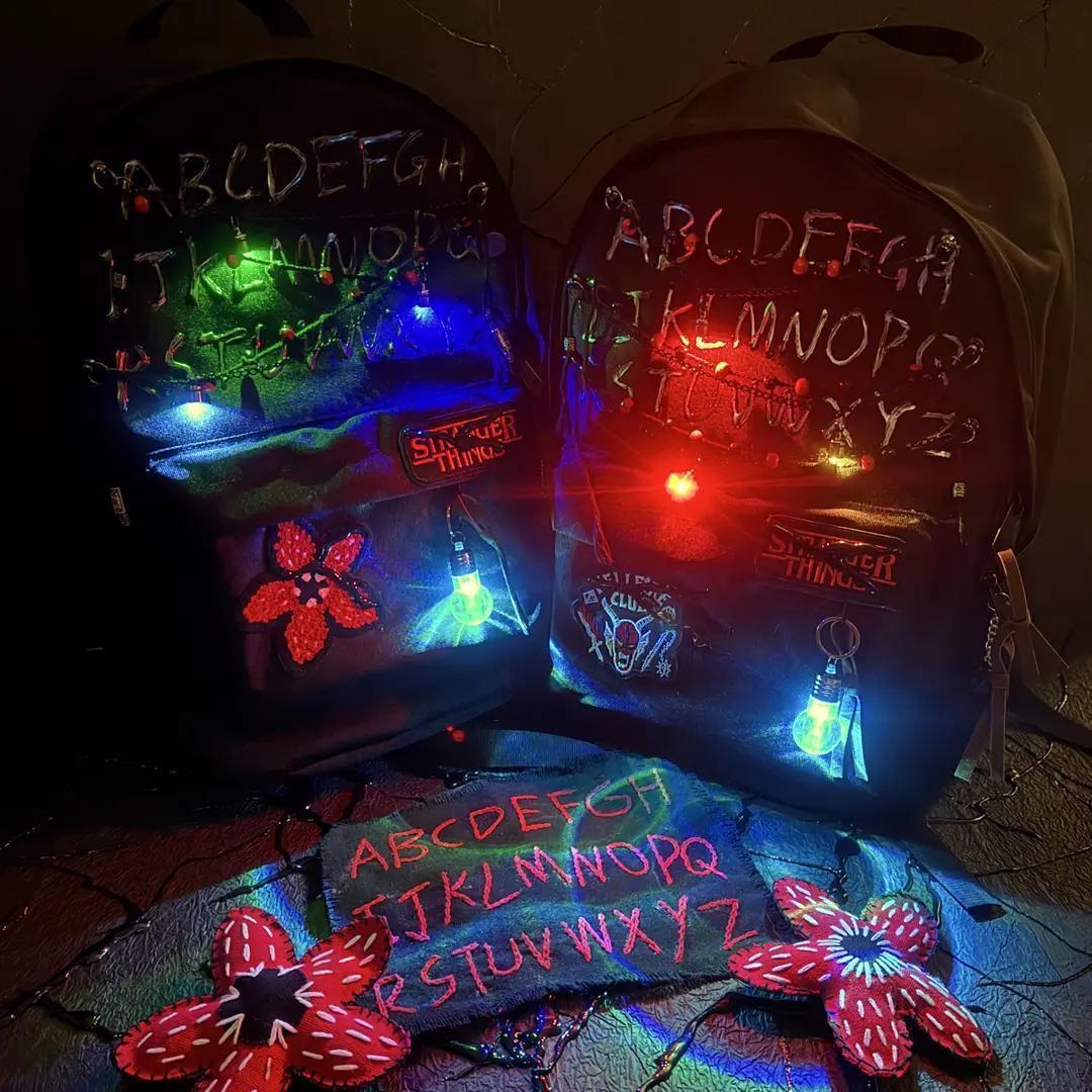 Stranger Things Backpack Shopping Bag Travel Bag Schoolbag Student WorkStudy Backpack Large Capacity Simple Design Red and Black Flower Pattern.