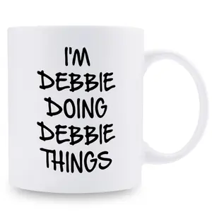 Humorous Debbie Doing Debbie Things 11oz Ceramic Mug White with Black Handles Microwave and Dishwasher Safe Ideal for Office Family and Parties