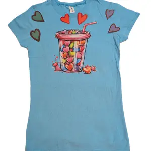 ladies .Tshirts. Blue  are size S.. purple  size M.