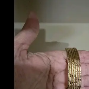 Banglez Gold-Tone Stackable Bangles for Women - Elegant and Versatile Jewelry Accessory