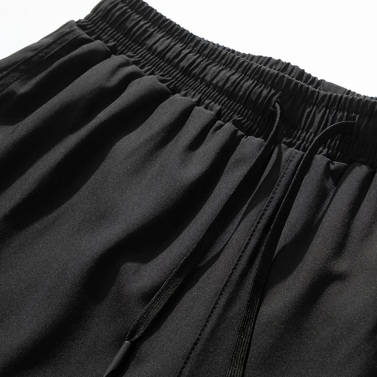 Men's sports shorts with side pockets, elastic waistband, and lightweight stretch fabric, suitable for running and casual wear - compression shorts | Gray running shorts | Fashionable sports shorts | Comfortable fit