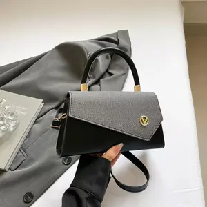 Handbag - Fashionable Design with Gold Accents and Adjustable Strap for Everyday Use, Stylish and Versatile Double-Sided Leather