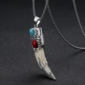A vintage Bohemian style wolf tooth-shaped pendant necklace with turquoise inlay, suitable as a creative unisex gift for friends or as a Christmas present