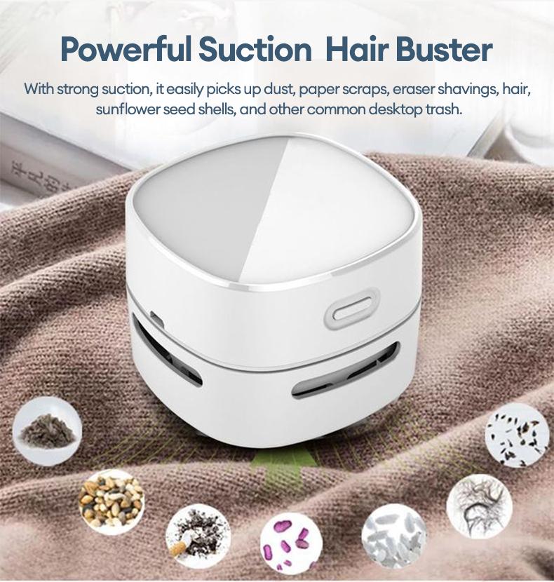 PAXA Desktop mini vacuum cleaner, equipped with a cleaning brush, with strong suction power and long-lasting battery life, suitable for desktop office use.