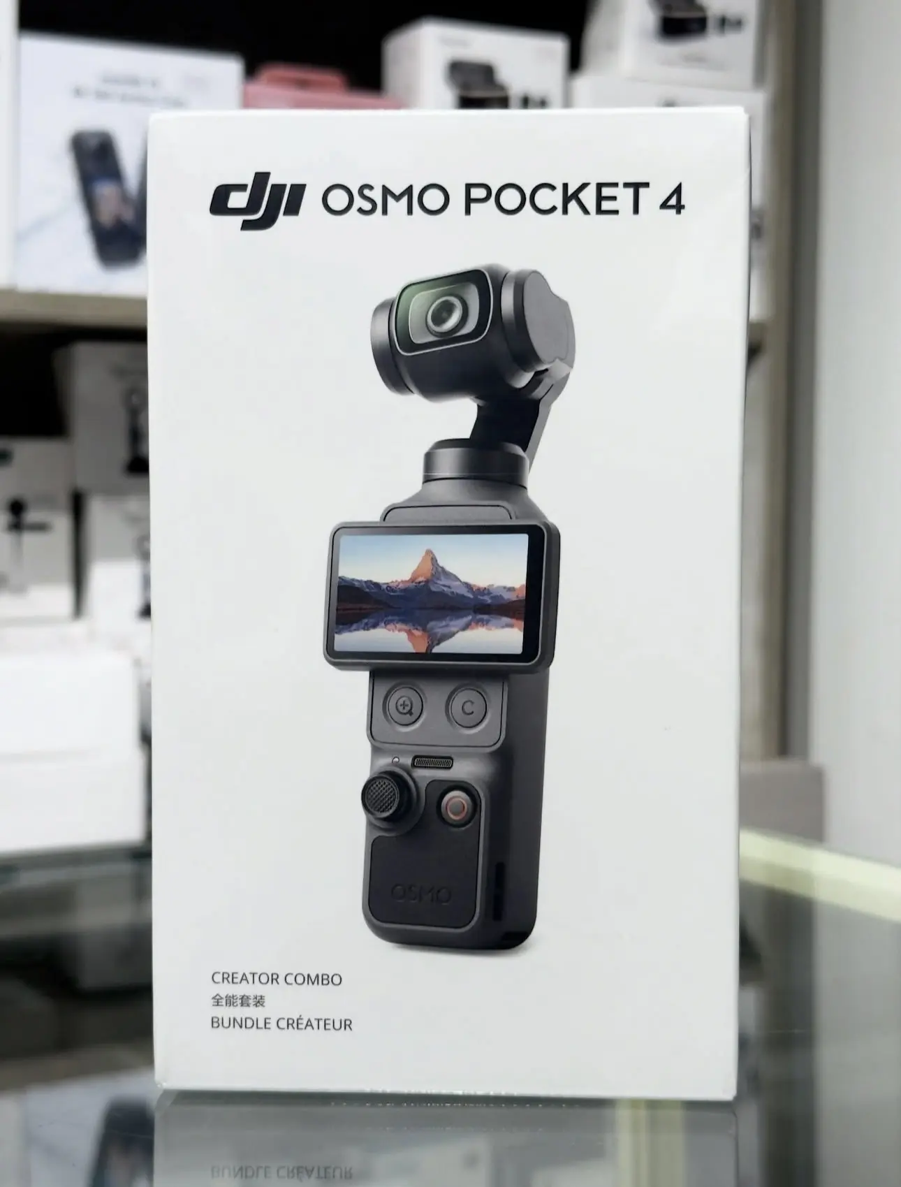 DJI OSMO POCKET 4 CREATOR COMBO CAMERA DJI OSMO POCKET 4 CREATOR COMBO CAMERA