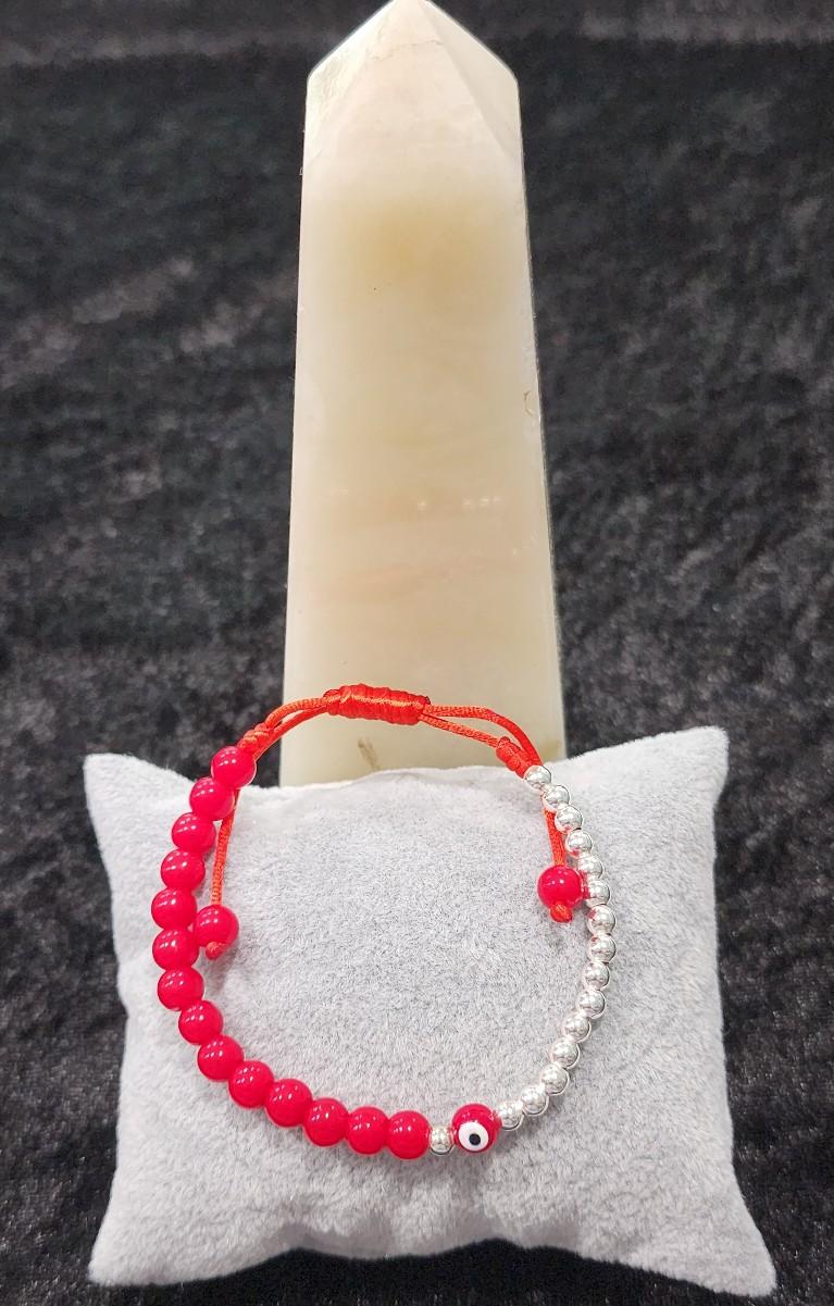 Pulsera ojo rojo y negro.Red and black eye bracelet.