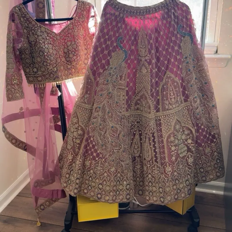 Indian Party Wear Lengha - Vibrant Pink with Intricate Gold Embroidery and Matching Dupatta for Festive Occasions