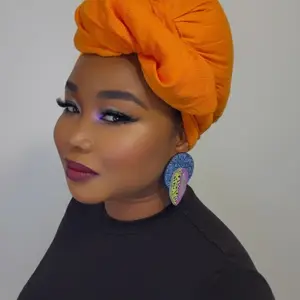 9/BAMI: Afrocentric acrylic lightweight stud statement earrings made with hypoallergenic materials, designed to express culture, pride, and heritage in a bold, modern way.