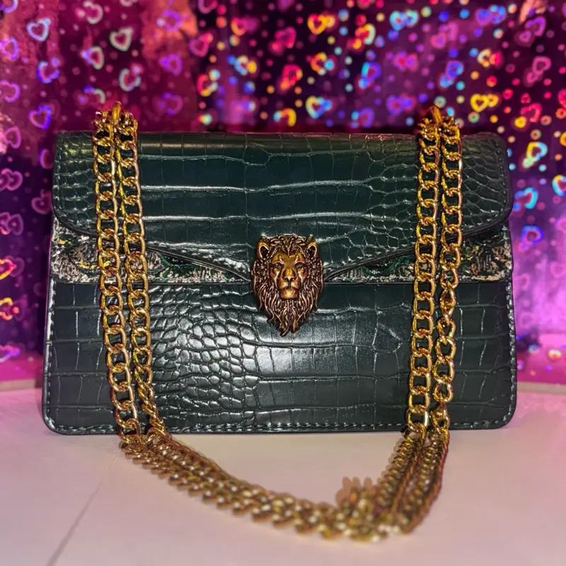 The Lioness Luxe Green & Gold Bag with Crocodile Texture and Lion Head Buckle