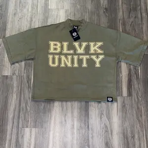 FOREST GREEN BLVKUNITY MIRROR STATEMENT TEE